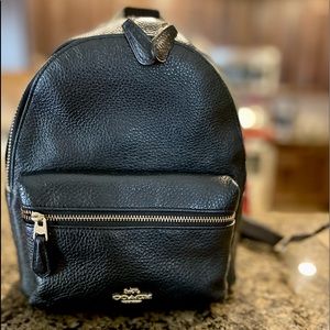 Small black coach backpack with nylon straps